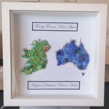 Load image into Gallery viewer, Two maps button design. Ireland and Australia are presented together in this 10 x10&quot; Irish made box frame. The maps are made up using tiny crystals, buttons and star embellishments.   Place names can be added to both maps written in wooden hearts. Personalised text can also be added to the top of the maps, the bottom or both. Please inform me of these details in the custom message box.
