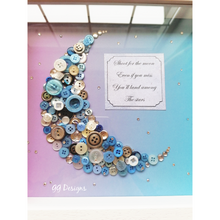 Load image into Gallery viewer, &quot;Shoot for the moon, even if you miss you&#39;ll land among the stars.&quot; I love this quote and it looks fabulous along side this blue button moon design. Although the quote can be changed to any of your favourites.  Lots of vintage buttons used on this design which i think makes it all the more special.  Just pop the text you would like into the custom message box.   Beautifully presented in a 10x10&quot; Irish made box frame.  Colours of background may vary depending on availability. 
