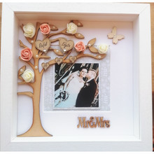 Load image into Gallery viewer, A beautiful wedding day gift. Presented in a 10x10&quot; Irish made box frame. Captures a personal memory for a lifetime. The wedding colours can be incorporated into the flowers decorating the wedding tree. A meaningful personal touch. 
