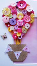 Load image into Gallery viewer, Personalised new baby gift. A super cute button hot air balloon loving handmade here in Co. Tipperary, Ireland. This colourful creation would be perfect in a nursery. Each balloon is individually made so no two are ever the same.    Beautifully presented in an Irish made box frame.    Suitable for a boy or girl.  A lovely christening gift.
